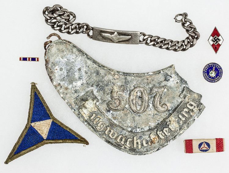 MILITARY INSIGNIA MISCELLANY: MILITARY INSIGNIA MISCELLANY Lot of various military patches, badges, and other insignia, mostly American and German, includes: German metal gorget, approx. 6" x 3", with a separate metal plate bearin