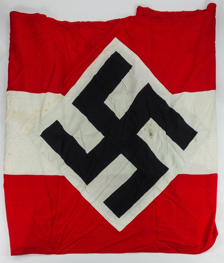 HITLER YOUTH FLAG: HITLER YOUTH FLAG Very large Hitler Youth flag, 20' 8" x 4' 5", constructed of three joined red and white bands, with an applied 32" by 30" diamond printed with a printed swastika at the center. The f