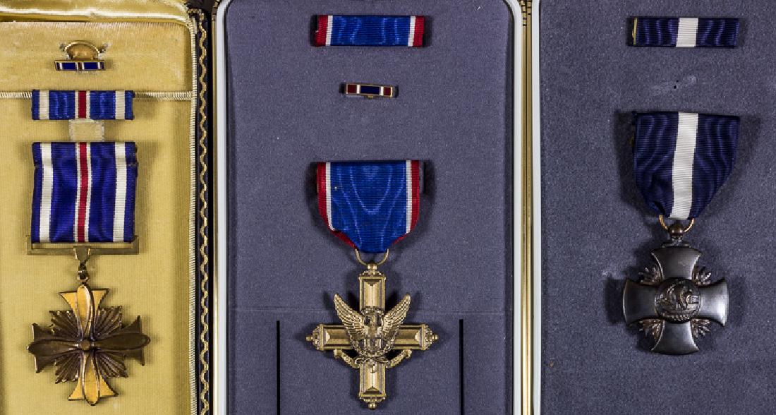 AMERICAN WORLD WAR II MEDALS: AMERICAN WORLD WAR II MEDALS Good lot of three cased World War II-era American military decorations, includes: Distinguished Flying Cross, Distinguished Service Cross, and Navy Cross, most cased in mo