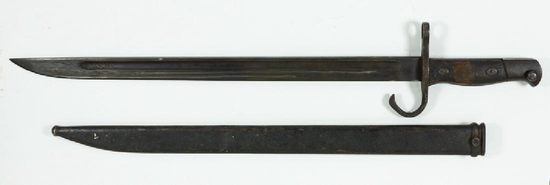 JAPANESE BAYONET: JAPANESE BAYONET Japanese World War II-era Type 30 sword bayonet, 15 1/2" blade, 20" overall, with wood grips secured with oval washers, and a curved quillion. The tang markings indicate that it was p
