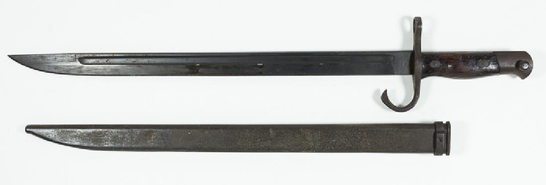 JAPANESE BAYONET: JAPANESE BAYONET Japanese World War II-era Type 30 sword bayonet, 15 1/2" blade, 20" overall, with wood grips secured with oval washers, and a curved quillion. The tang markings indicate that it was p