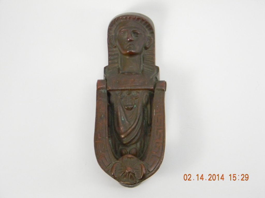 Victorian Door Knocker: Victorian door knocker. Approximately 81/2" long and about 3'' wide.