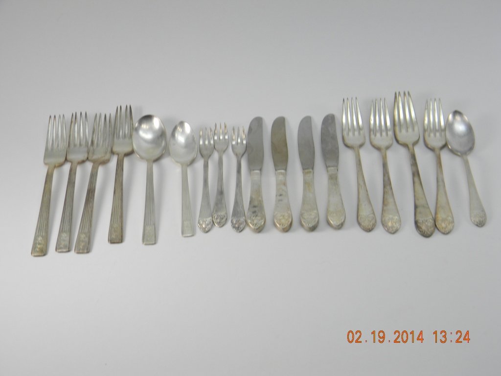 Set of Waldof Astoria Bear & Bull Hotel Flatware: Lot of Waldof Astoria hotel and Bear in Bull steak room flatware. International silver flatware. Lot includes 8 big forks non matching, 3 small forks matching, 2 small spoons matching, 1 table spoon, 