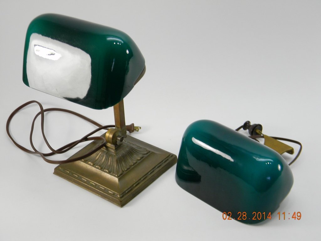2 pcs.Emeralite Desk Lamp & Shade With Brass Frame: Emeralite desk lamp, brass with green case glass shade, early 20th C. CONDITION: chips on rim of glass shade. Emeralite shade with lamp top frame only. Condition small chip on front right. both lights