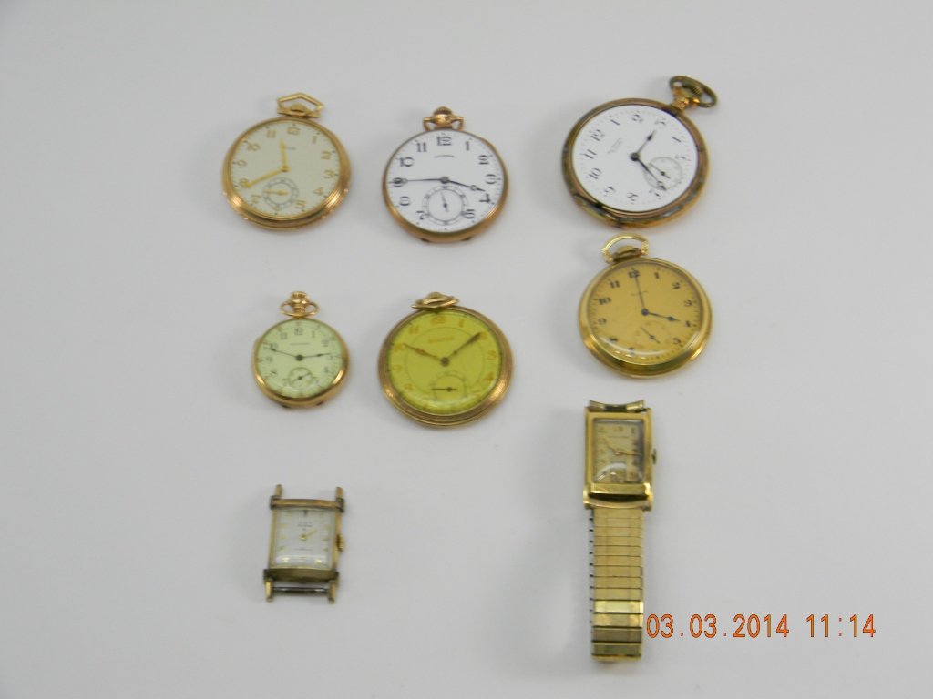 Assorted Lot of Gold Filled Watches: Six gold filled open-faced pocket watches: Two Elgins', the white face has no crystal and winds up and runs but not sure for how long, the gold face crystal has a slight crack. One Bulova that runs wi