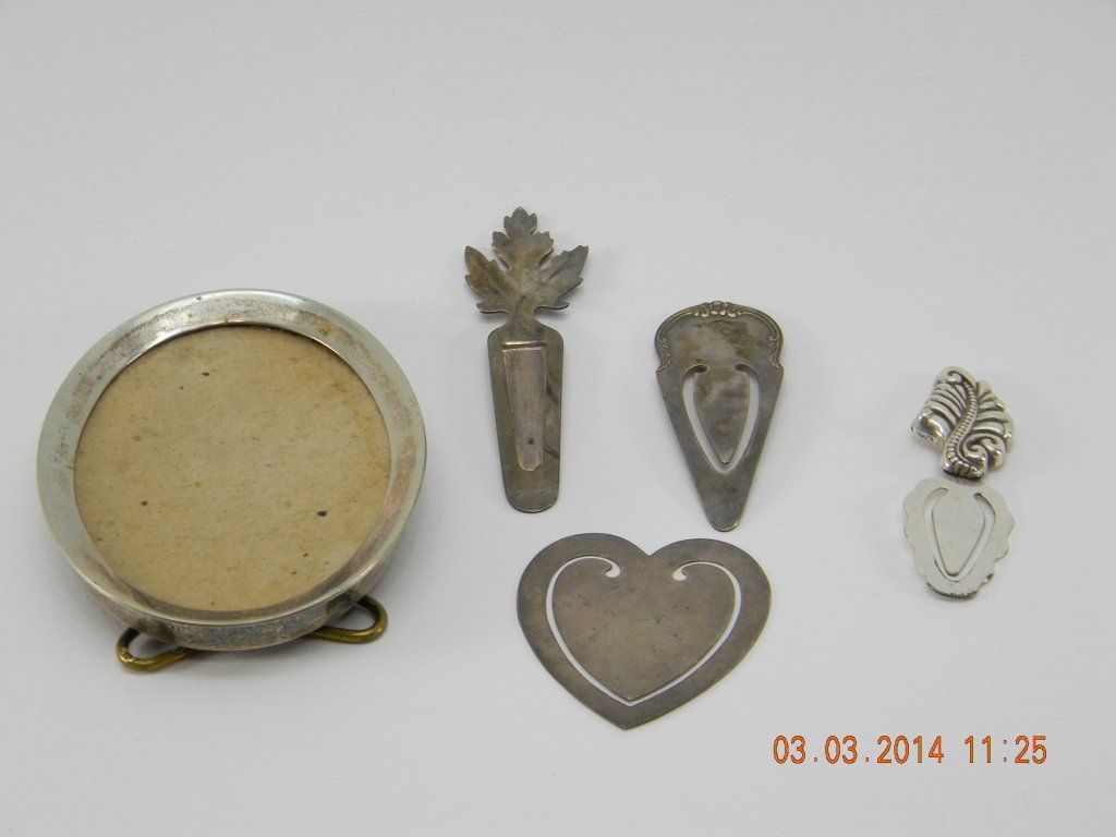 Lot of Sterling Tiffany Kirk & Son Book Marks: This Sterling lot includes 1 small picture frame stamped silver, 1 Brighton book mark silver tone, 1 S. Kirk & son book mark, and 2 Tiffany & Co. book marks stamped sterling. Total weight of sterling 