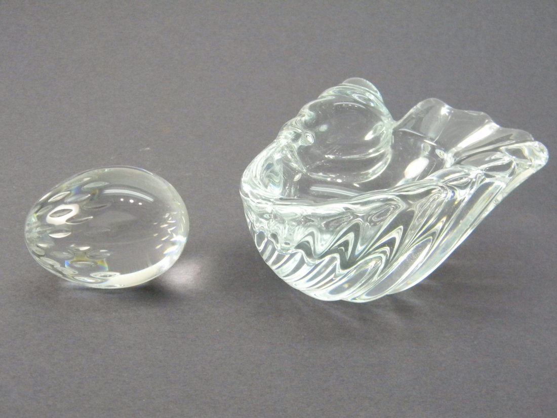 Crystal Baccarat Egg & Crystal Vannes France Bowl: Signed crystal baccarat egg; approximately 2.5'' tall. Signed crystal Art Vannes France shell bowl; approximately 5'' in diameter. Some minor useage marks on bottom.