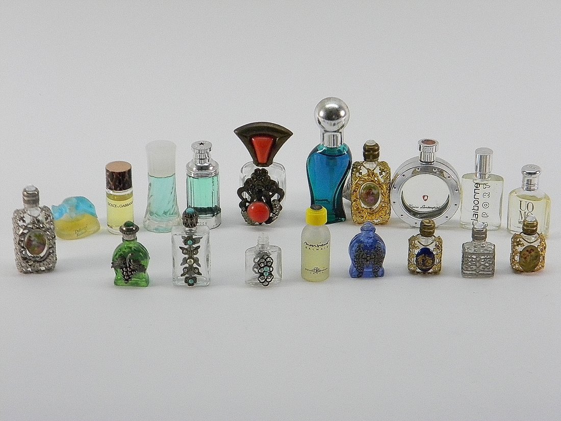 Lot Of Perfume Bottles: Lot of decorative perfume bottles. Lapis Lazuli, Pierre balmain, Dolce Gabanna. Some have perfume several others are empty.