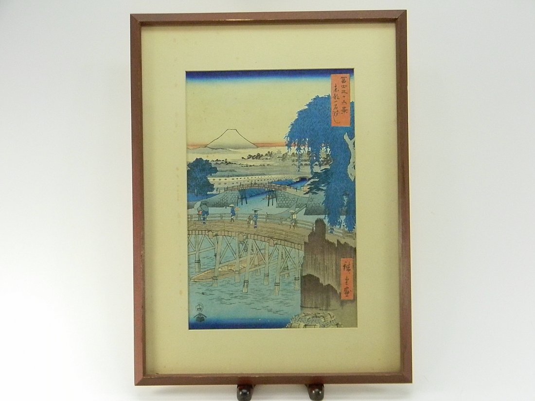 Hiroshige Ando Mt Fuji Woodblock Print: Hiroshige 1979 - 1858. 36 views of Mt.Fuji,Tohtoichikokubashi print. Chop marks. Some minor foxing on mat. _x000D_ http://www.liveauctioneers.com/item/27413755_hiroshige-ando-woodblock