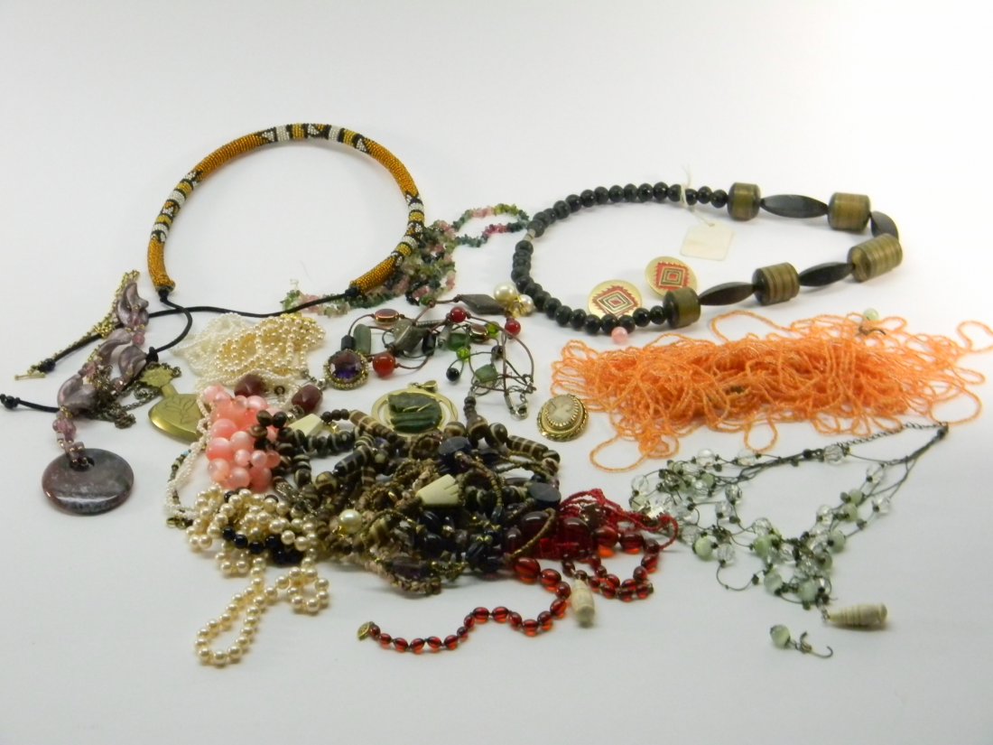 Lot of Costume Jewelry: Costume lot includes necklaces, bracelets, and some lockets.