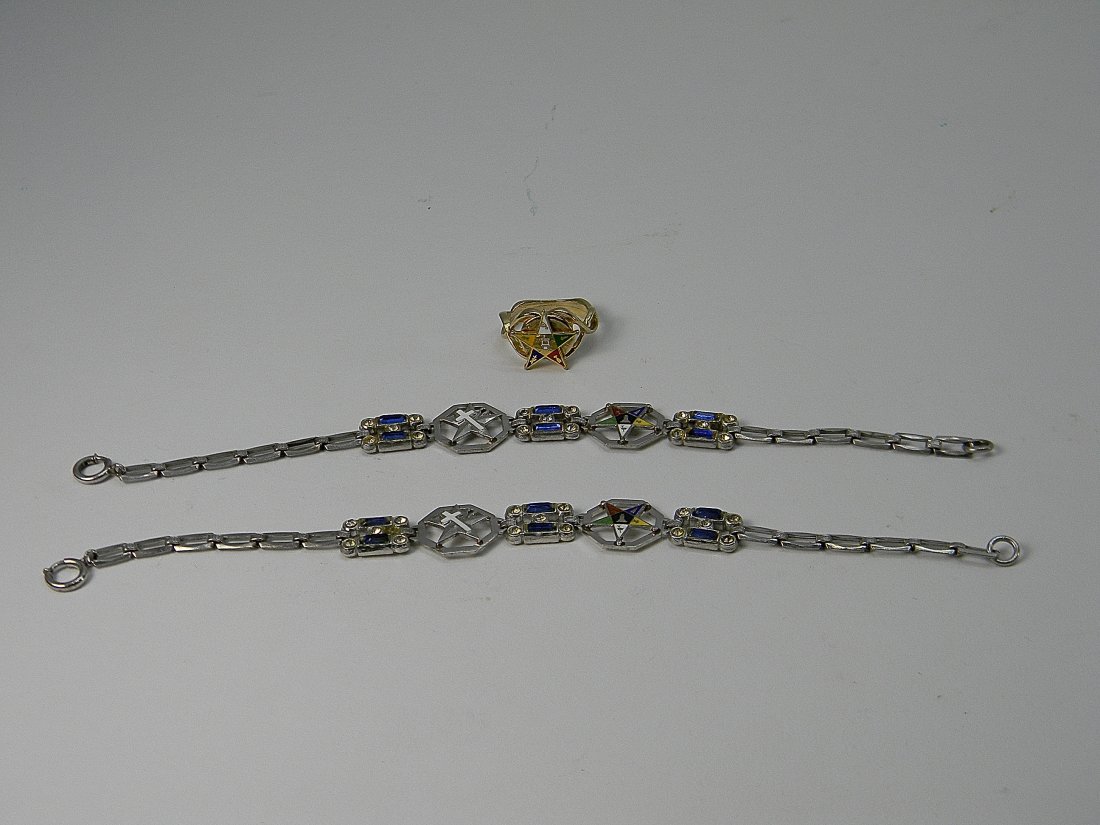 Lot Fraternal Silver Masonic EOS Bracelets & Ring: Lot of Masonic & Order of the Eastern Star Sterling & Blue Jewels Bracelets & Ring. Charms marked sterling. Bracelet approx. 7.5'' long. Ring is size 7.5. Bracelets weigh approx. 23 grams.