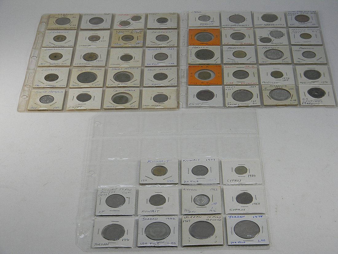 Lot 51 Middle Eastern Foreign Coins 1921-1998: Cypress, Lebanon, Saudia Arabia, Pakistan, Kuwait, Jordan, Morocco. Lose pages.