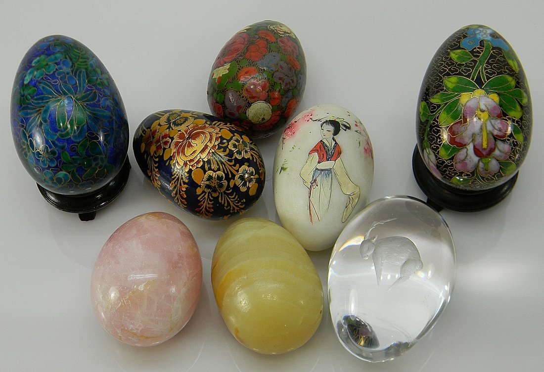 Lot Decorative Cloisonne Marble Crystal Wood Eggs: Lot of 8 includes: 2 cloisonne eggs on wood stands, 1 solid marble painted figure of Chinese woman with script egg, 2 solid marble/quartz eggs, 1 crystal etched figure of a abstract deer egg, 2 paint