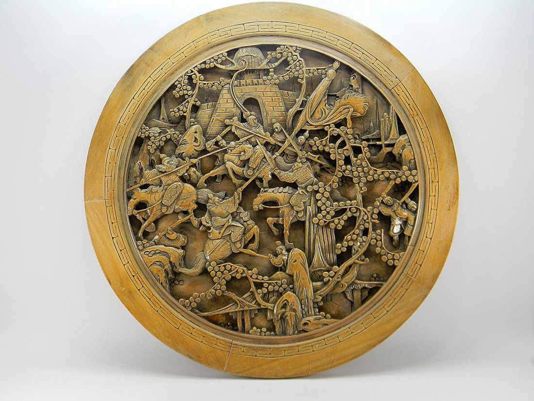 Antique Chinese Warrior Carved Relief Wood Plaque: Very Well Done and Detailed Antique Carved High & Deep Relief Wood Wall Plaque. Chinese Warriors on Horses and Hand to Hand Combat. Warriors Battle Defending Temple. Approx 31'' in diameter.