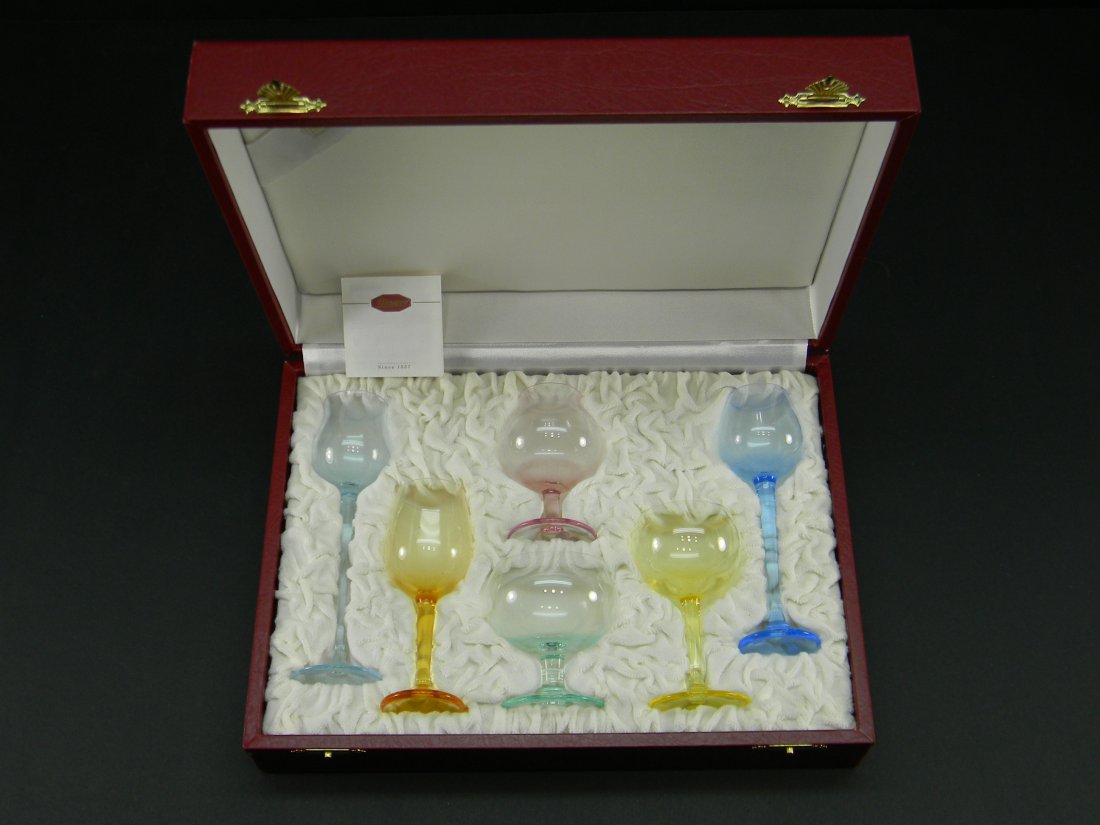 Set 6 Moser Colored Glasses in Box Various Sizes: Salesman sampler? 6 Moser Czech Republic various color and size glasses. Stem, brandy, goblet. Includes blue, green, yellow, pink, purple, and orange in original red fitted presentation box. Between 3