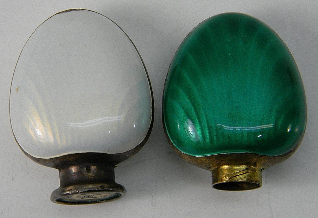 Guilloche Enamel Bottles Sterling T in Shield: Pair White & Green Guilloche Enamel Bottles, Has holes in top, May be Salt & Pepper Shakers, Marked 925 and letter "T" in Shield. Approx. 2.25''. Weight:48 grams, Missing one lid.