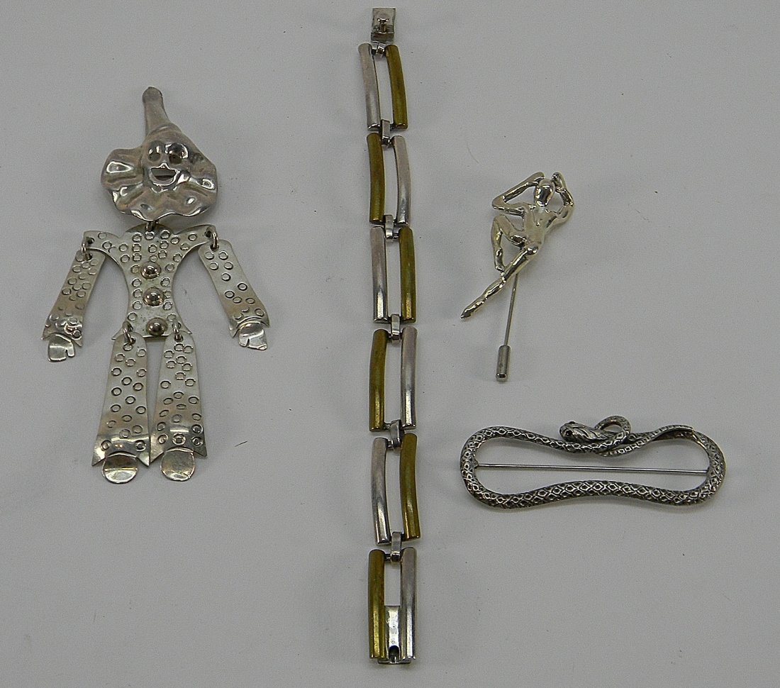 Lot of 4 Sterling Dangling Clown, Snake, JJ, Taxco: Lot Includes: 5" reticulated clown marked Taxco 925, 1 8" long modern style sterling and brass bracelet marked Taxco 925, 1 Sculptured figure of man stick pin marked 925, 1 fancy figural snake with ga