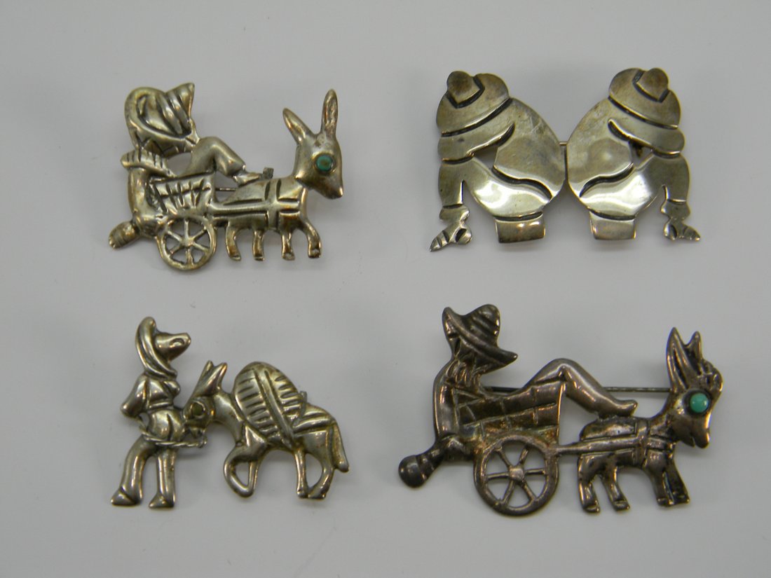 Lot Sterling Pins Man Wagon W/ Donkeys "J Alvarez": Lot includes: 3 Sterling Pins Man on Wagon W/ Donkeys,1 Signed Sterling Mexico, 1 Signed Silver Mexico, 1 Signed Silver Mexico "ABM". 1 Siesta Two Men Pin Signed "J Alvarez". Weight: 33.2