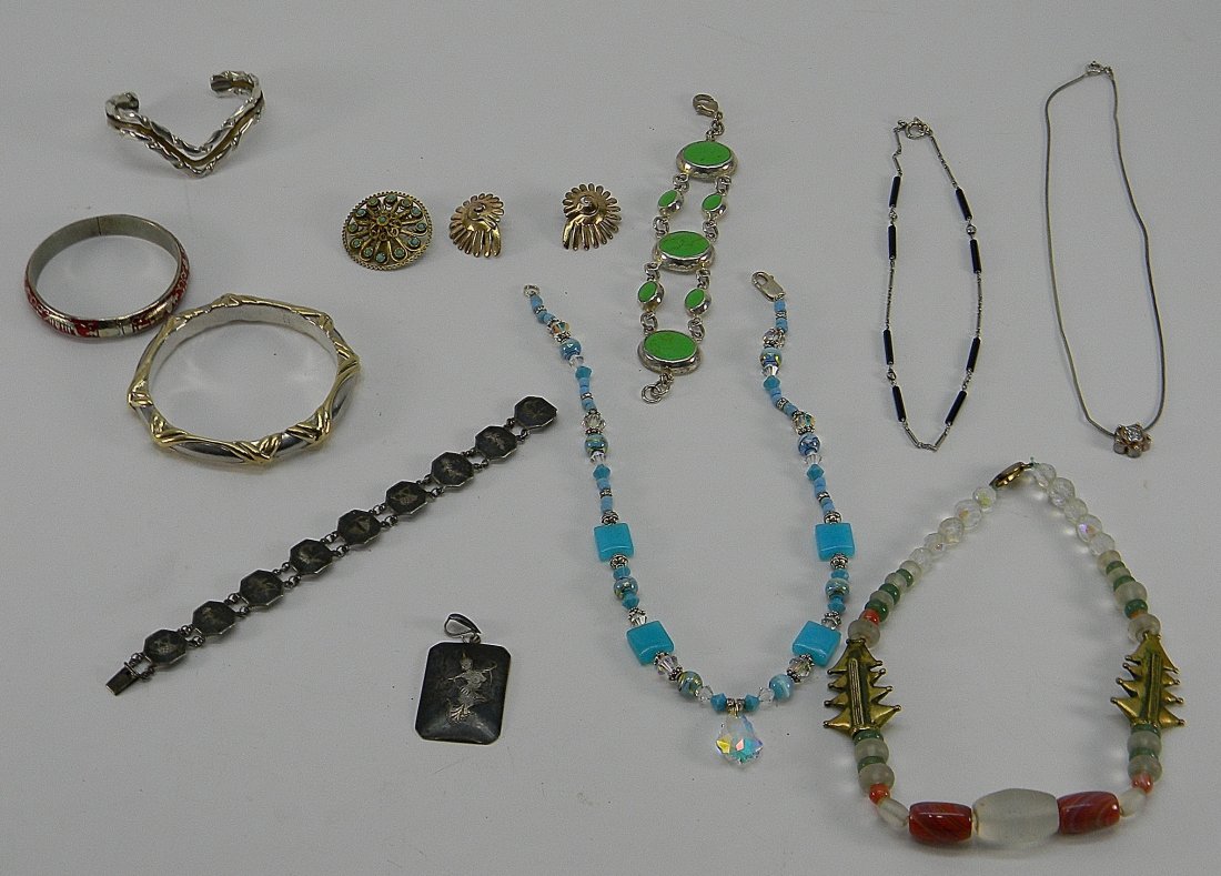 Lot of Sterling Jewelry Renee Lepre, Brian Bergner: Lot of 13 pcs Includes: 1 pair earrings,1 pendant, bracelet & red bangle all signed Siam, 1 alpaca bracelet W/ green stones, 1 signed Renee Lepre 3 band brass and sterling bangle.1 sterling gold accen