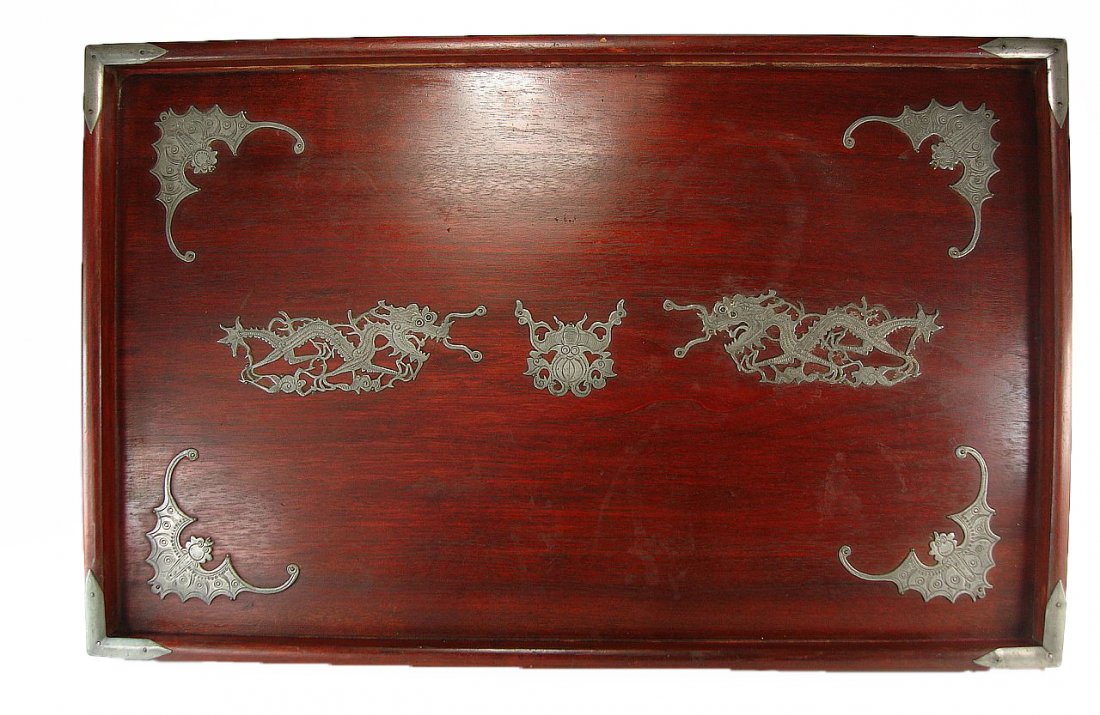 Chinese Mahogany or Rosewood Tray Wei-Hai-Wei City: Chinese tray made out of a Mahogany or Rosewood type wood, with pewter decorations of dragons and bats, with a label on the back that says "Tung King Shun Factory, Wei-Hai-Wei City." The tray is in go