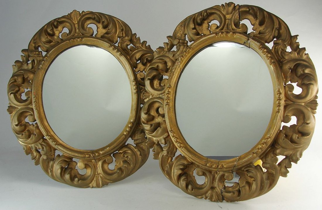 1850s Pair Gilt Carved Florentine Mirrors: Pair of gilt Florentine mirrors. Mirrors are in good condition, there is some splitting to the hand carved ovals. Gold painted over the original gilding.Height:14 1/4 Inches (36.5 cm)Width :12 3/4 Inc