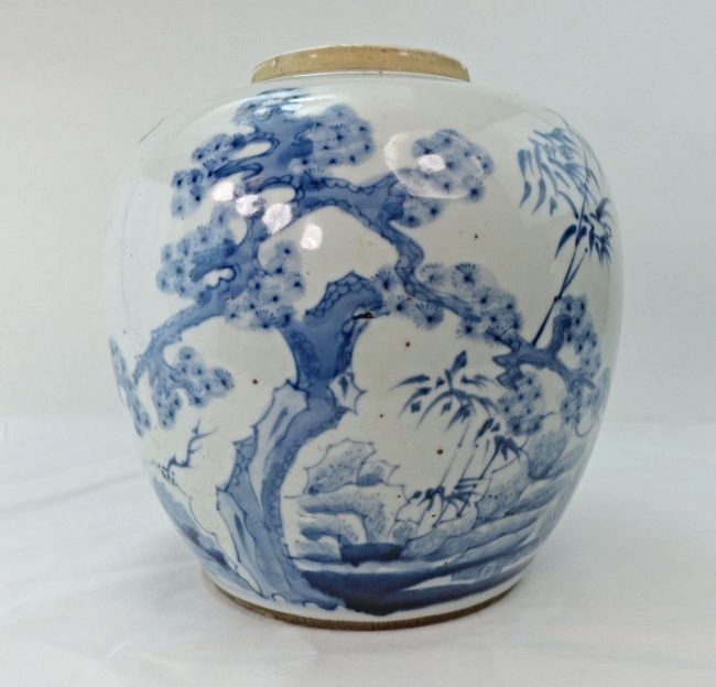 Chinese Blue and White Ginger Jar Three Friends Winter: Old Chinese Ginger jar with painted landscape of Three Friends of Winter, Prunus, Bamboo, and Pine Trees. Â Height 7 7/8 Inches (20.1 cm) Width 8 Inches (20.5 cm)There are some spiderweb cracks visi