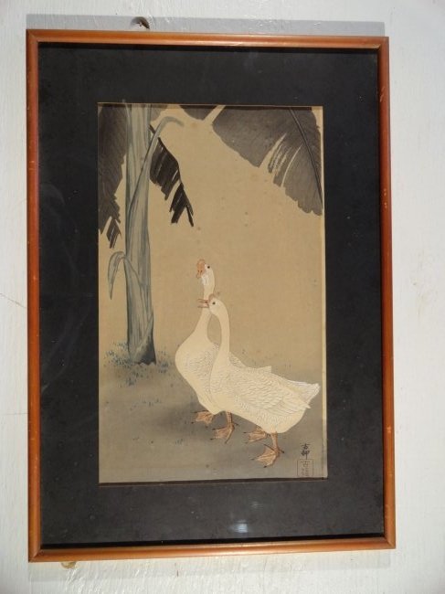 Japanese Woodblock by Ohara Koson of Two Geese: Interesting Japanese woodblock signed with a seal by Ohara Koson, the woodblock features two geese beneath a banana tree. Â Woodblock Height 15 3/4 Inches (40.0 cm) Woodblock Width 9 1/2 Inches (24.