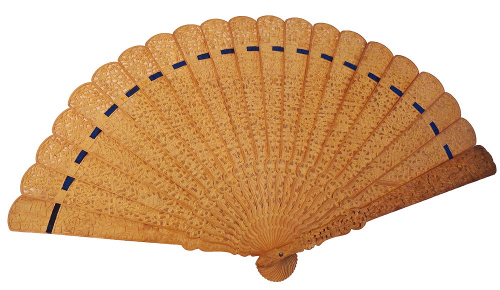 Antique Chinese Export Carved Sandalwood Fan: Very well carved antique Chinese export Sandalwood fan, with silk box. The exterior sticks are deeply carved while the interior sticks have a lattice work design. Length: 9½ Inches (24.1 cm) Width 16