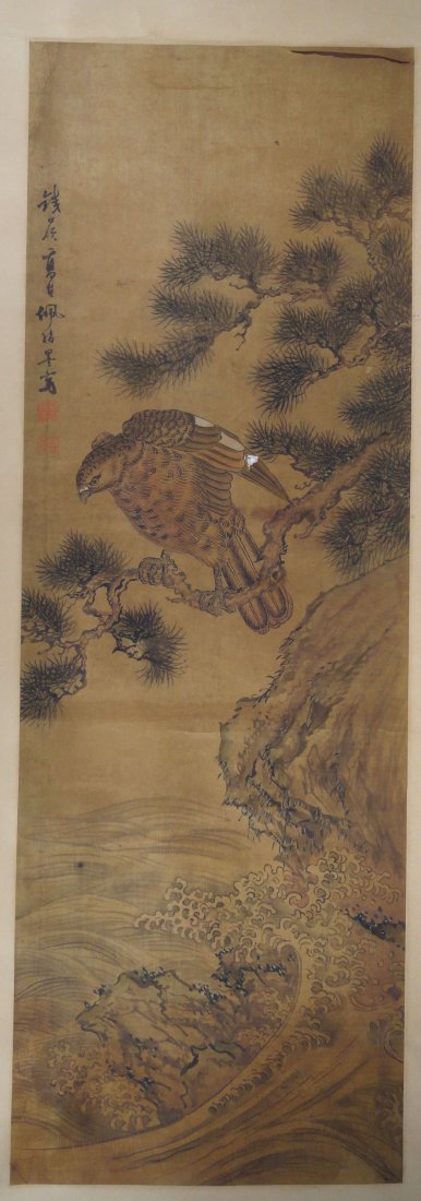 Japanese or Chinese Scroll Painting of a Hawk Signed: Old signed scroll, either Japanese or Chinese, of a Hawk in a pine tree above crashing waves, the painting is done on paper and has a number of old repairs. It signed on the left hand side over the to