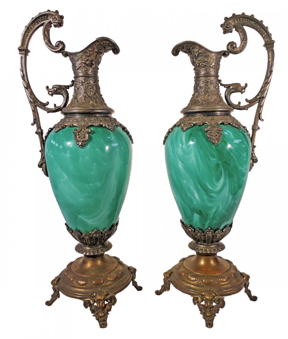 Fine Pair of WMF Art Glass Ewers Claret Jugs 1870's: Fine pair of 25 year presentation silver plated ewers or claret jugs with swirled green art glass on a bronze base. The bronze bases are signed WMF I/0 on both bases, and the silver plated areas are t