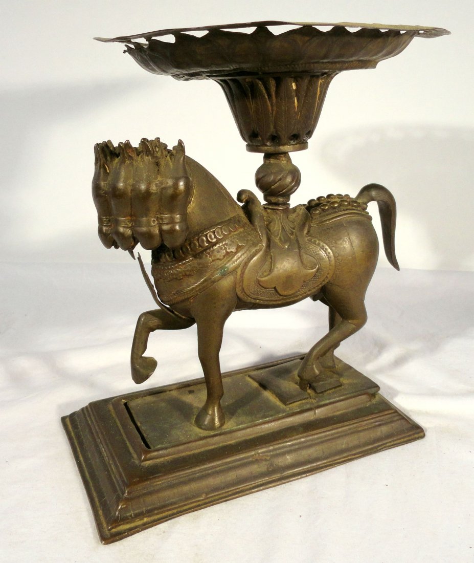 Rare Indian Bronze Horse Statue Altar Piece Hindu Diety: Well cast bronze statue of the Hindu 7 headed horse god Uchaishravas, the bronze looks like it was probably used as an offering stand or a candle holder for religious purposes. The bronze appears to b