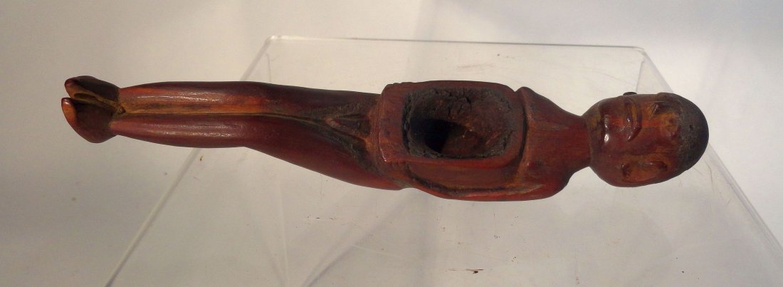 African Carved Wood Figure Nkisi Congo Yombe Nkondi: Antique African carved wood figure, a Nkisi or Nkondi spirit figure, with a large carved vacancy in the stomach filled with a resin material, with more of the resin on the head. The figure is probably