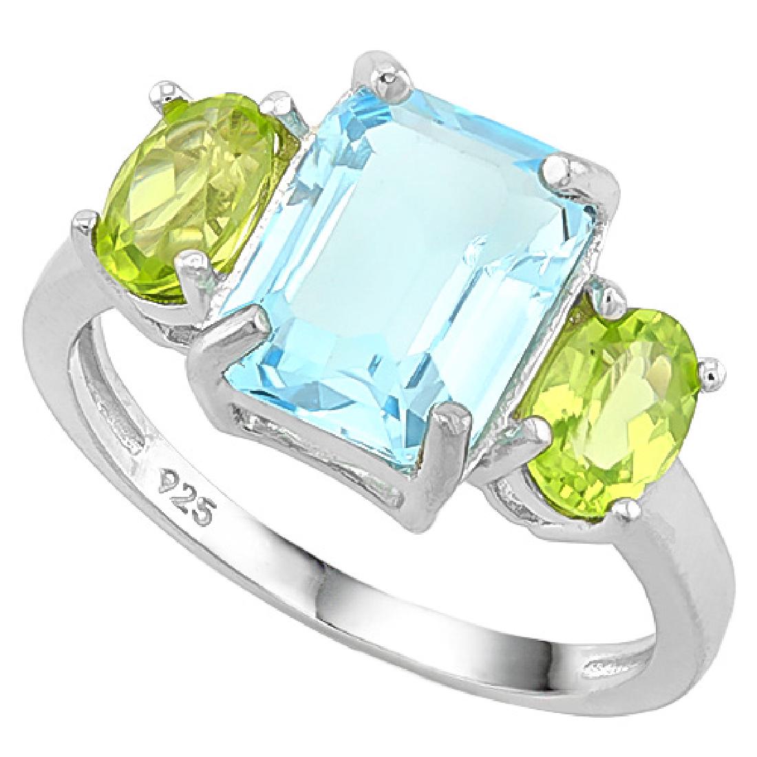 4CT STUNNING EMERALD CUT BLUE TOPAZ/PERIDOT RING (1 of 1)