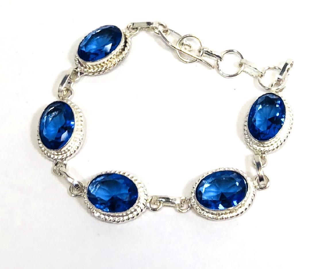 COOL BLUE TOPAZ 14CT OVAL SET STERLING BRACELET (1 of 1)