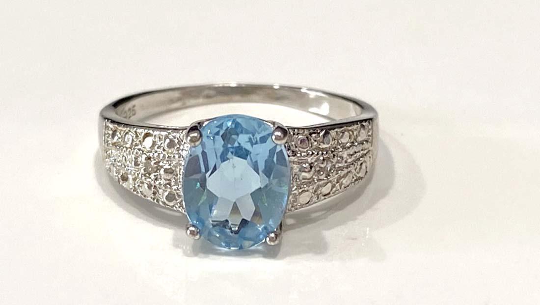 OUTSTANDING BLUE TOPAZ 4CT SOLITAIRE STERLING RING: SIZE 7