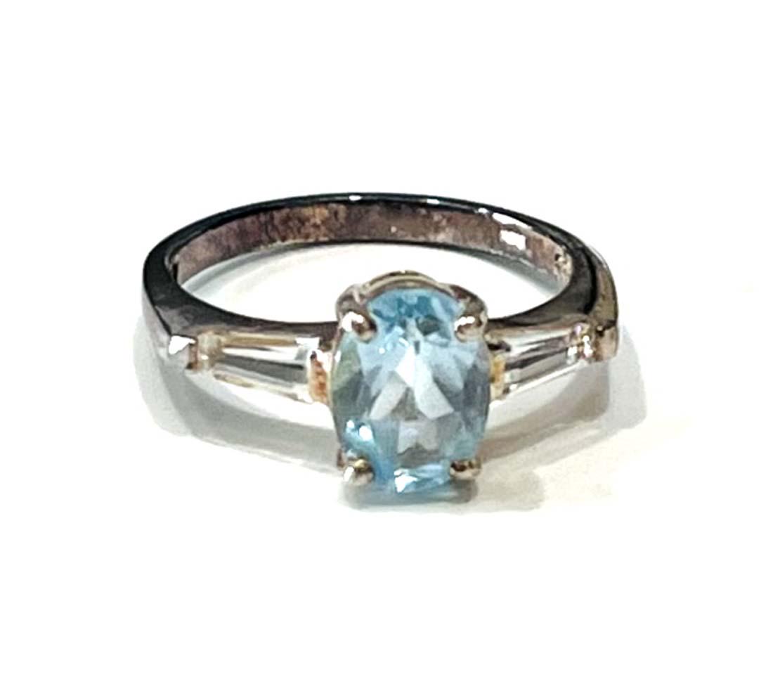 DAINTY BLUE TOPAZ OVAL SET 1CT SOLITAIRE STERLING RING (1 of 1)