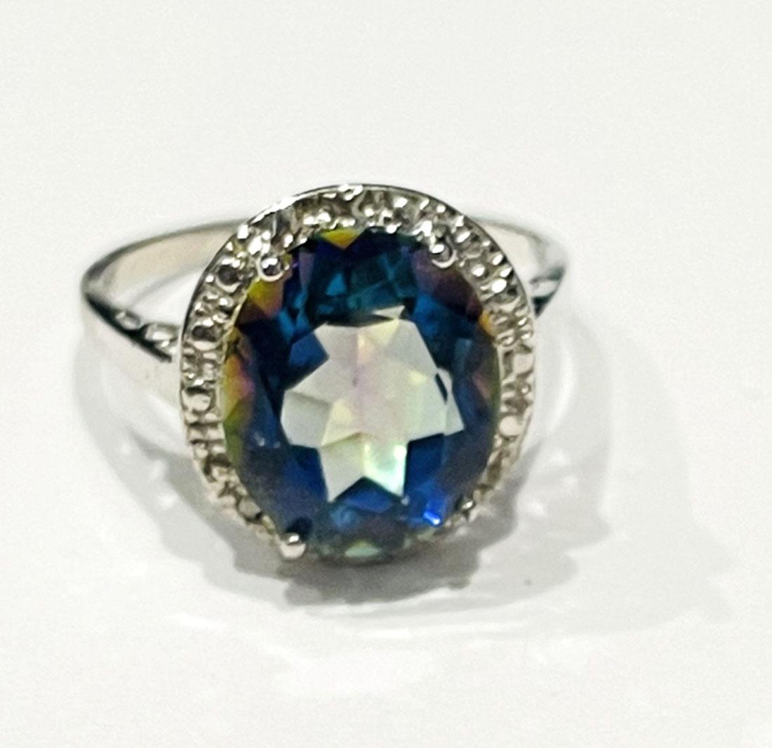 SHIMMERING OCEAN BLUE TOPAZ 5CT OVAL SET RING (1 of 1)