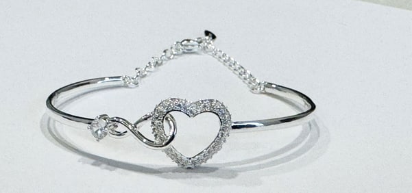 EXQUISITE CZ ENCRUSTED STERLING HEART BRACELET