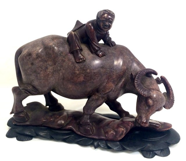ASIAN CARVED SOAPSTONE BULL FIGURINE ON STAND: 11"ACROSSX8"HIGH