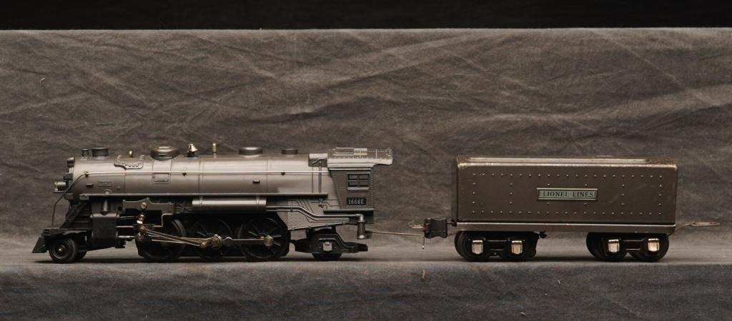 Lionel 1666E Gun Metal Steam Engine & Tender. : The set contains 1666E steam 262, 2689 W tender. Engine very clean C-7. Tender with scratches and paint loss. C-5