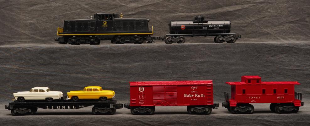 1956 Lionel Post War 628 Southern Pacific Set.: Includes 628 diesel, 6424 flat car with cars, 6025 oil tanker, 6014 Baby Ruth, 6257 caboose. Cars in above grade condition. C-7