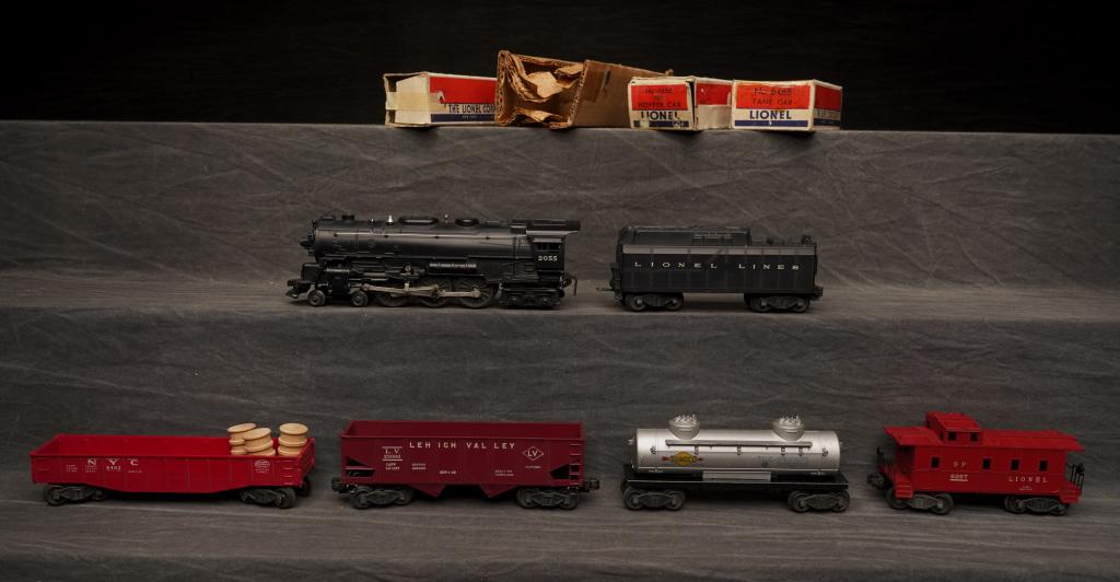 1953 Lionel 2055 Steam Loco. No.1503WS.: 2055 steam, 6026 W tender, 6462 gondola, 6456 hopper, 6465 tanker, 6257 caboose. Engine and cars in good condition w/ slight wear, boxes w/ taped corners and flap loss. C-6