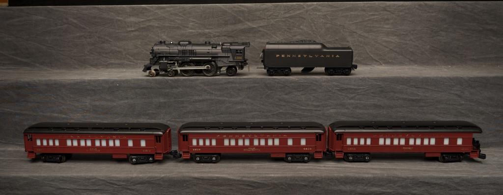 Lionel 027 G Broadway Limited Train Set.: Set contains 8304 Pennsylvania Railroad loco w/ tender, three passenger cars, transformer, track, original box. Four Pennsylvania passenger cars are also included. All appear in above grade condition.