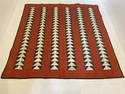 Folk art hand sewn quilt.