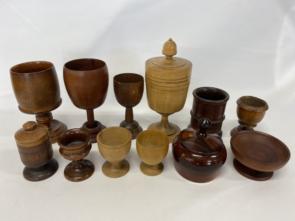 Collection of primitive wooden egg cups. (1 of 7)