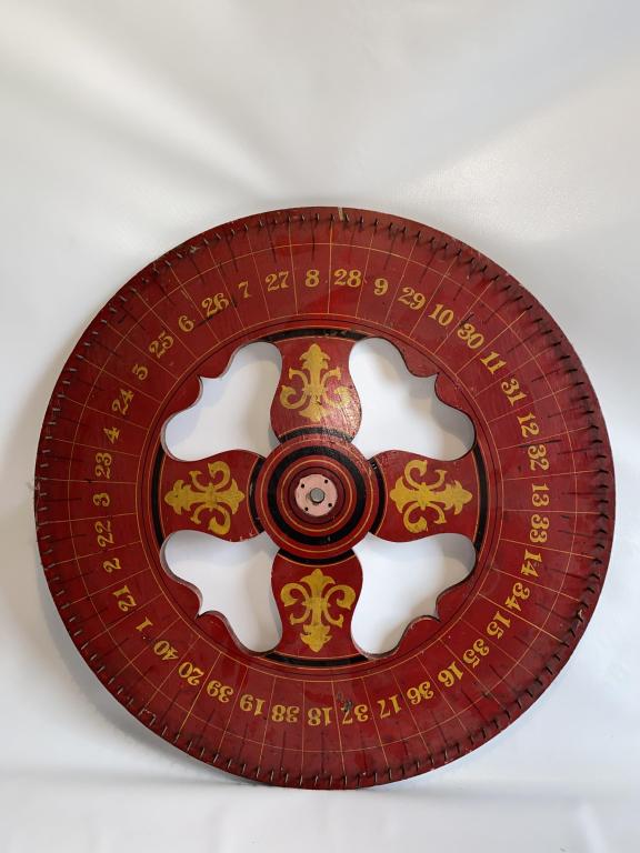 Early paint decorated carnival wheel. (1 of 12)