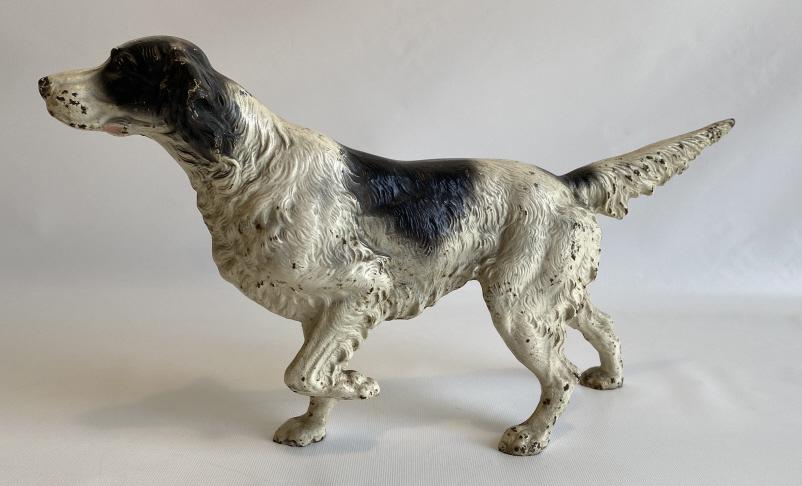 Cast iron English setter door stop.: Very good original painted surface. Measures 16" x 9".
