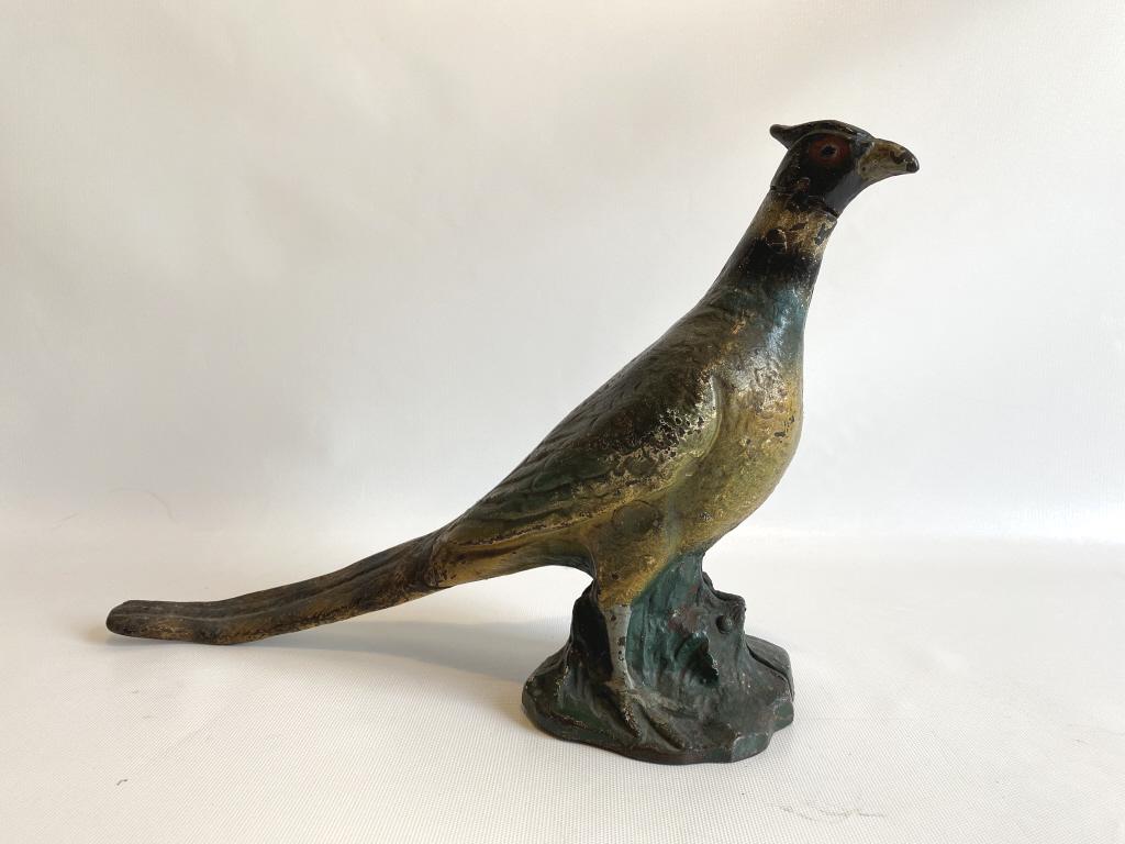 Cast iron pheasant door stop. (1 of 3)