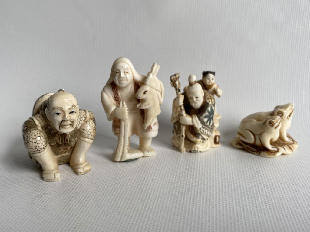 Early carved signed Japanese Netsuke. (1 of 4)