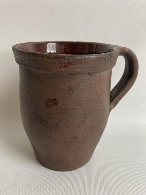 Early redware pottery mug. (1 of 6)